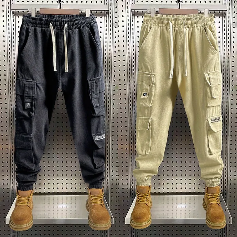 

Men's Work Pants Are Durable Loose Versatile and Have Multiple Pockets They Are Suitable for Autumnsports and Are Simple Casual