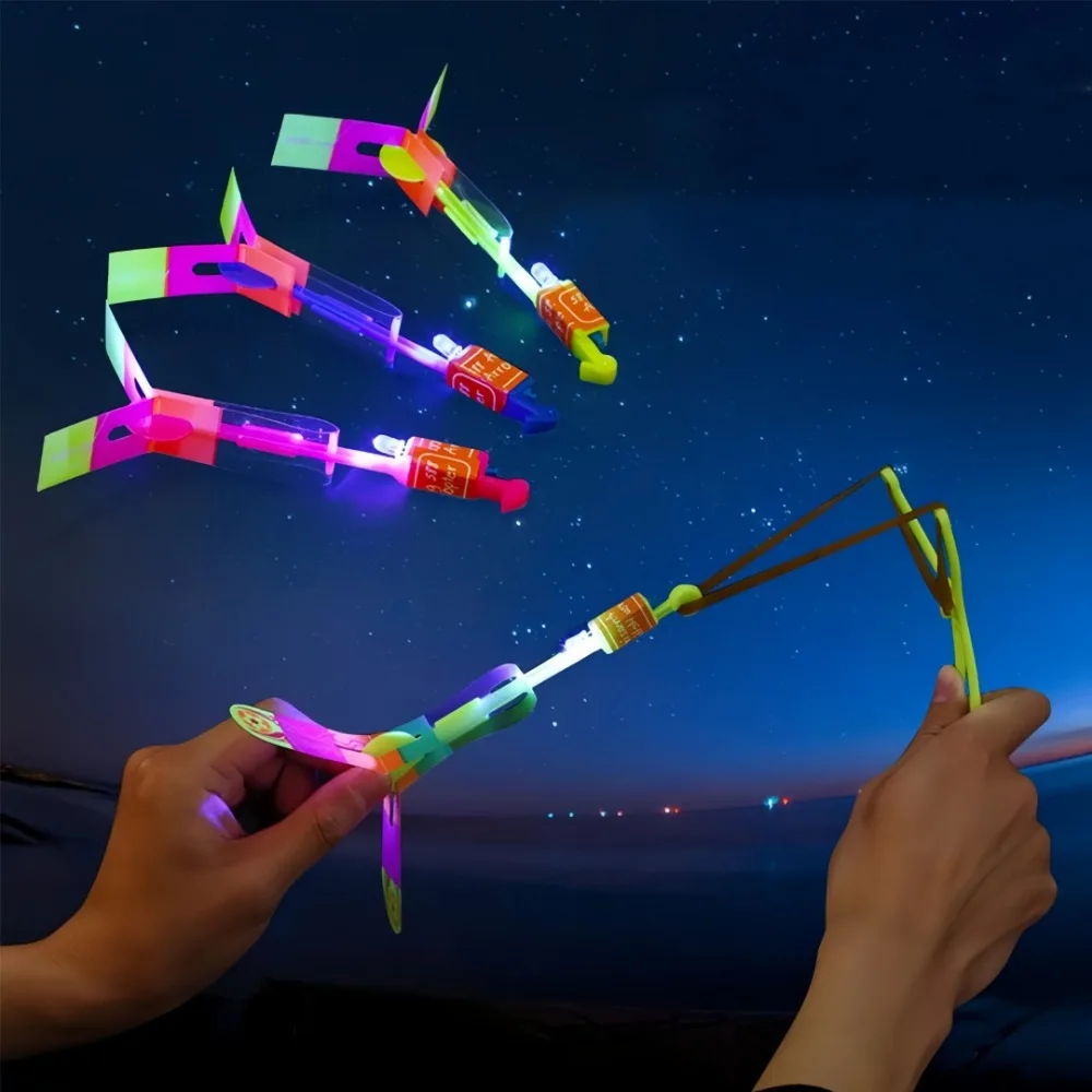 

Double Flashing Light Flying Arrows 10pc - Glowing Rubber Band Toys for Night Markets Street Vendors Holiday Party Gifts