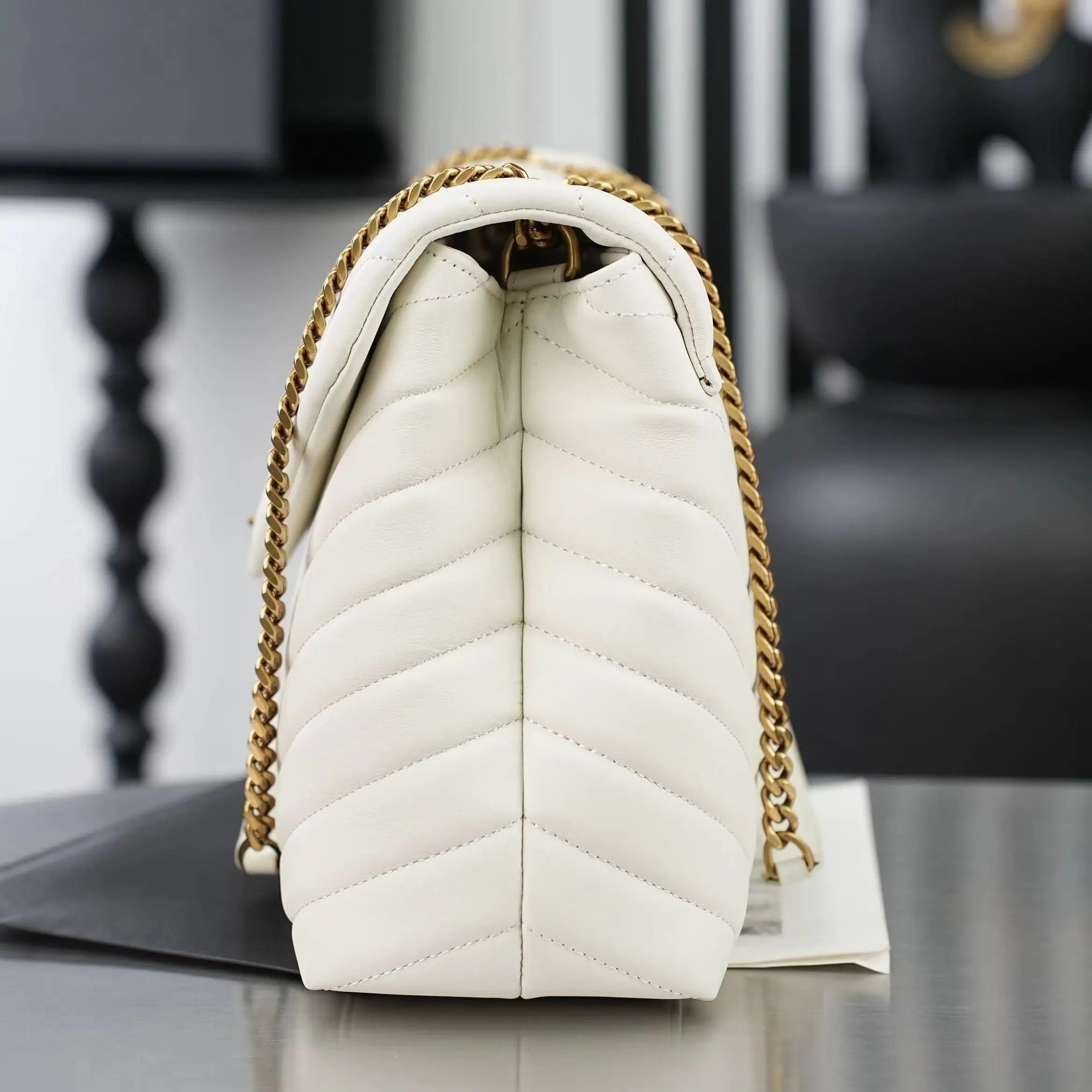 Smooth lambskin crossbody bag with all Y-shaped quilting, double chain design, matte leather surface, and large capacity.