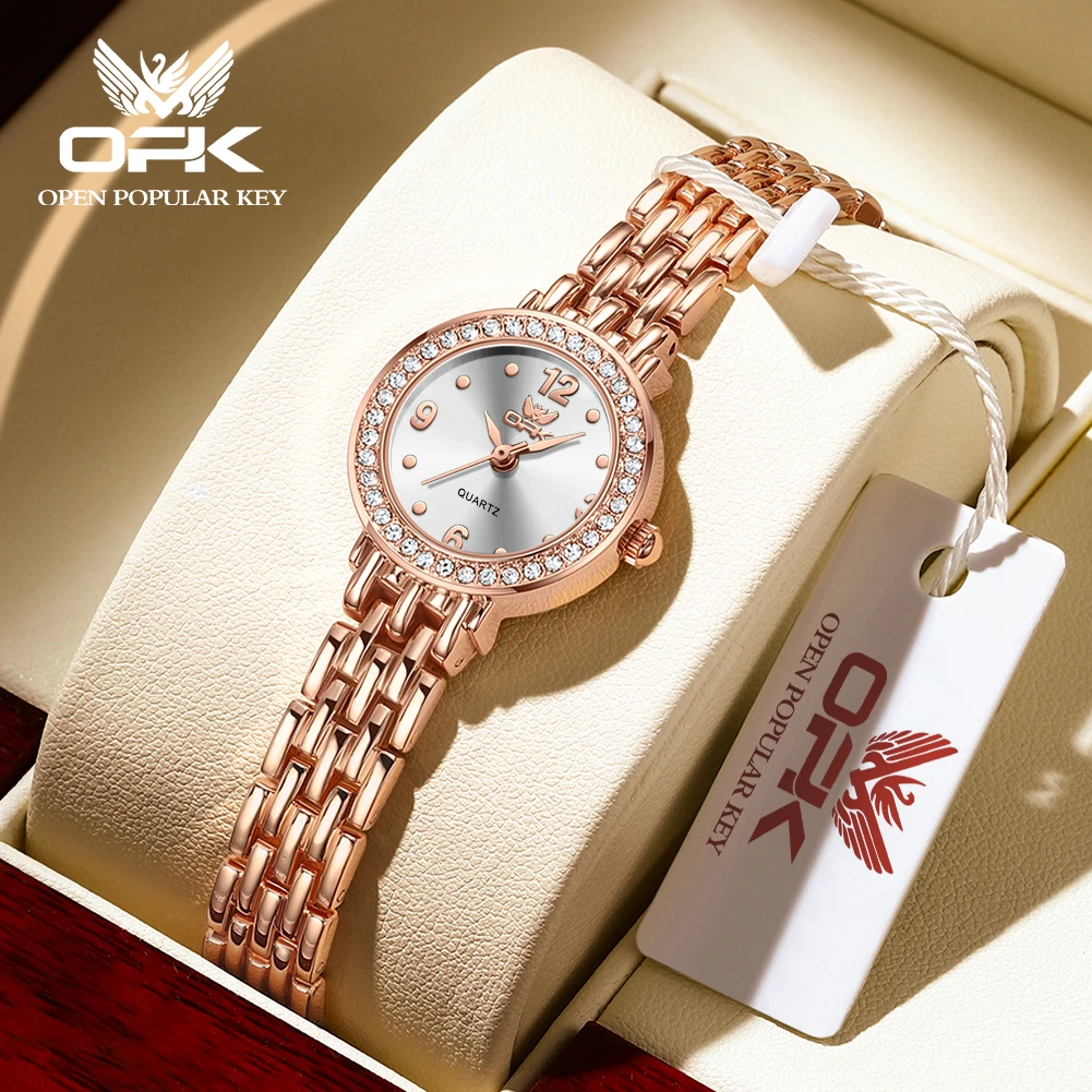 OPK brand waterproof three-pin diamond-encrusted steel belt ladies quartz watch 6009