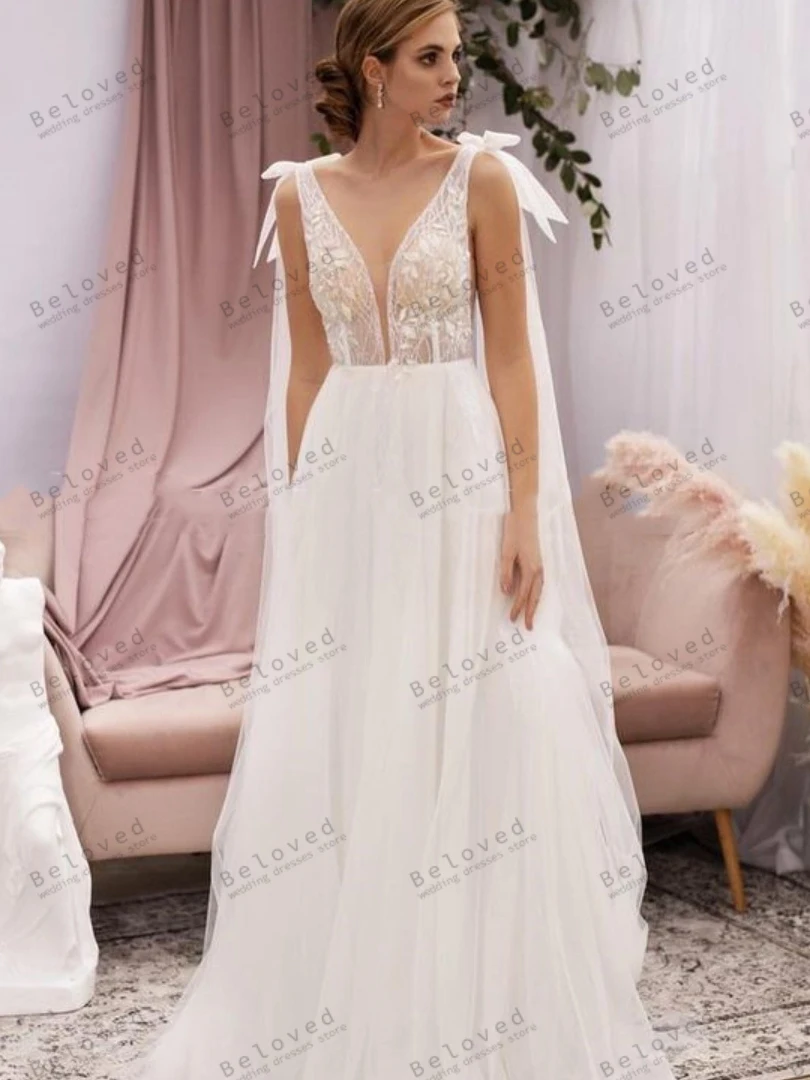 Anmutige Brautkleider sexy ärmellose rücken freie Brautkleider Spitzen applikationen boden lange Roben für Bräute Vestidos de Novia