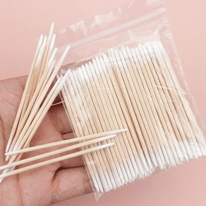100 個使い捨て綿棒超小型ブラシマイクロウッドメイクブラシ糸くずの出ないまつげエクステンション接着剤除去メイクアップツール