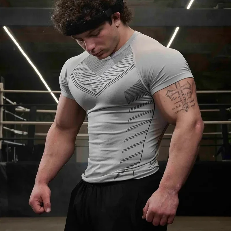 Gym Sports T-shirts Training fitness Men T-shirts Quick breathable elastic tight clothing Basketball tops Short Sleeves T-shirts