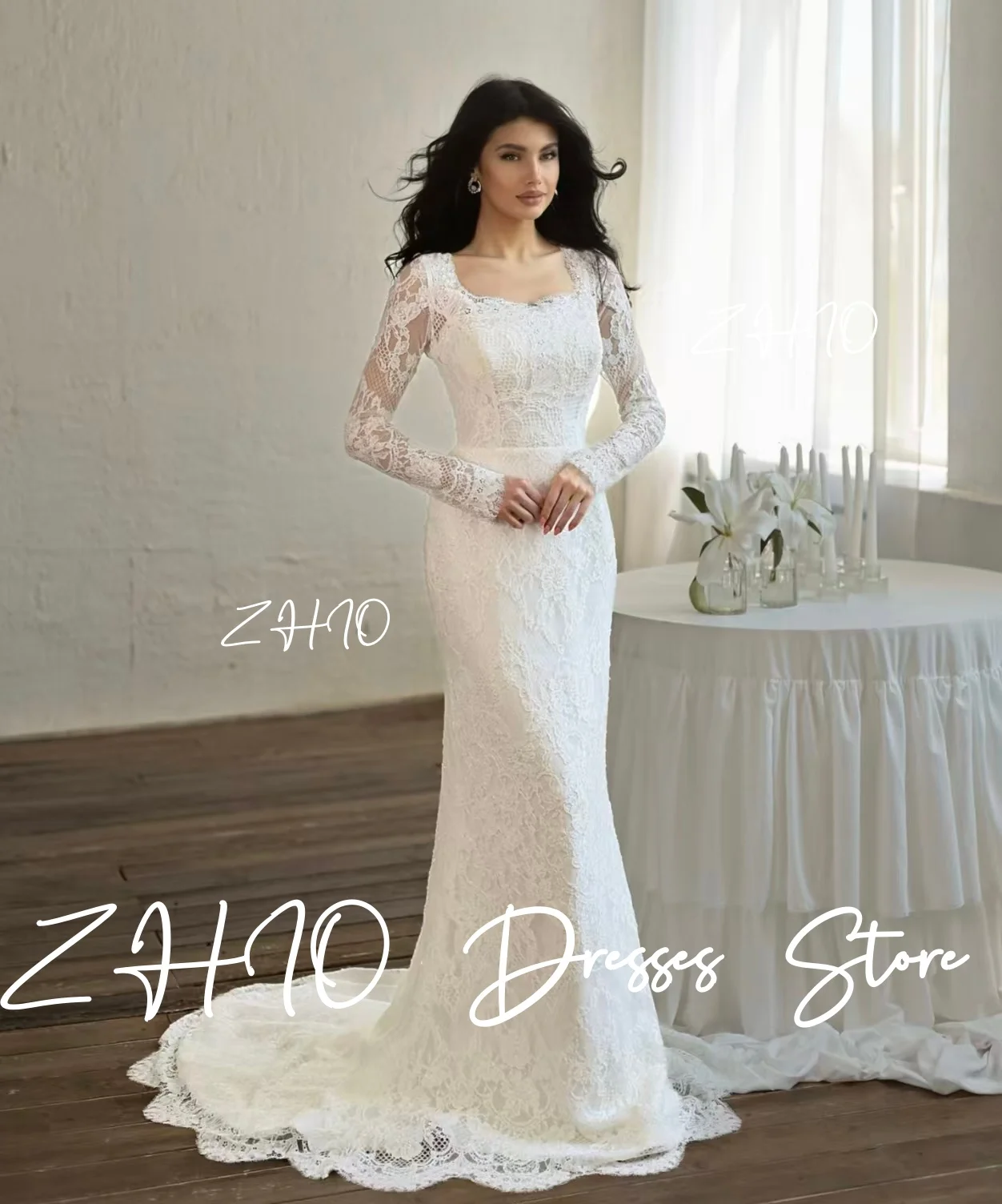 ชุดแต่งงานลูกไม้สีขาวหรูหรา แขนยาวทรงเมอร์เมด พร้อมชายกระโปรงยาวแบบสวีปเทรน  ชุดราตรีสั่งตัดได้  ชุดเจ้าสาว