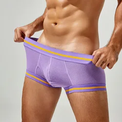 Sexy men's boxer shorts with low waist and comfortable front opening pockets, breathable scrotum and hip lifting triangle pants