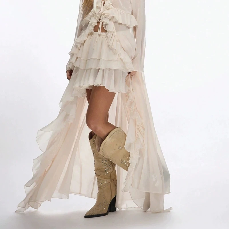 

Chic Hollow Out Irregular Split Skirts Women Simple Elastic Swing Cake Half Skirts Fashion New Solid Ruffles Loose Maxi Skirts