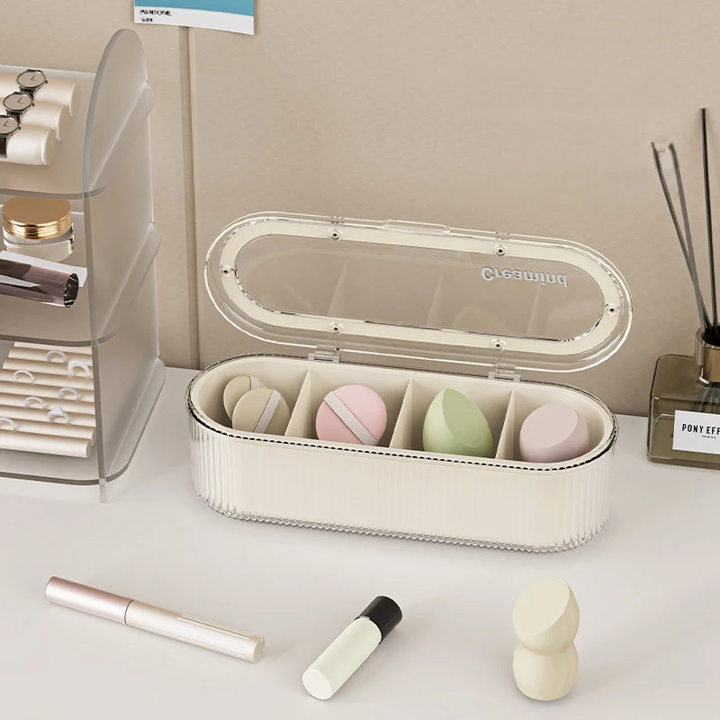 Przezroczysty organizer na pędzle do makijażu, pudełko do przechowywania gąbeczek do pudru i kosmetyków typu beauty egg, stojak do suszenia z pokrywką, pyłoszczelny pojemnik na narzędzia kosmetyczne.
