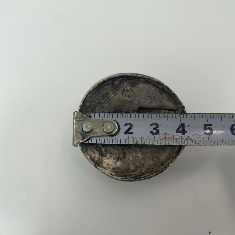 Miscellaneous items five pieces of silver ingots a honeycomb-shaped base decorated with sharp points