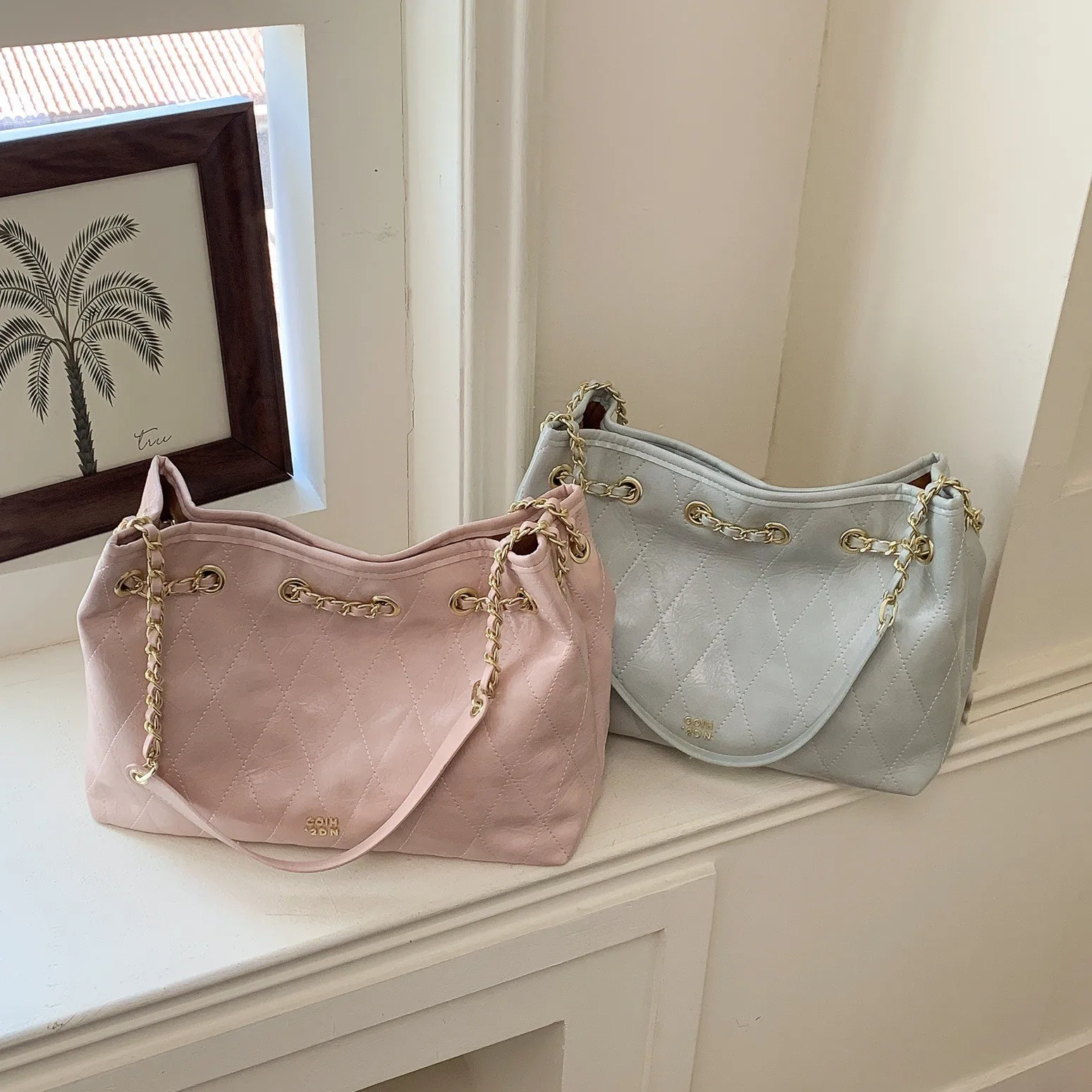 borsa-a-secchiello-in-pelle-cerata-effetto-retro-di-tendenza-borsa-a-tracolla-da-donna-con-catena-stile-piccolo-profumo-nuova-collezione-estate-2026