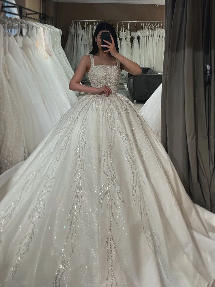 สแควร์ชุดแต่งงาน Organza เย็บปักถักร้อยประดับด้วยลูกปัด Ball Gown แขนกุดชุดเจ้าสาวปุ่ม Vestido De Novia ที่กําหนดเอง