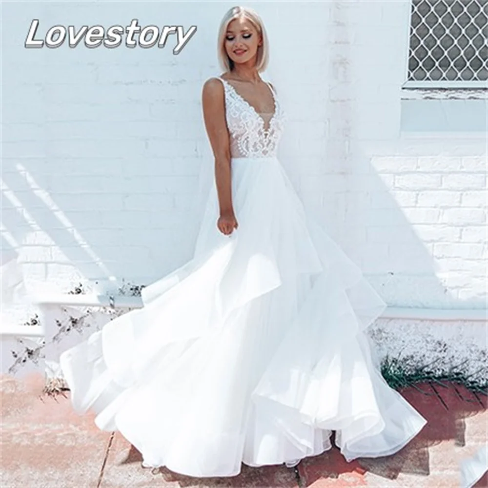 

Gorgeous A-Line Wedding Dresses Sleeveless Bride Robes V Neck Backless Bridal Gowns Appliques Buttons Lace Vestidos De Noiva