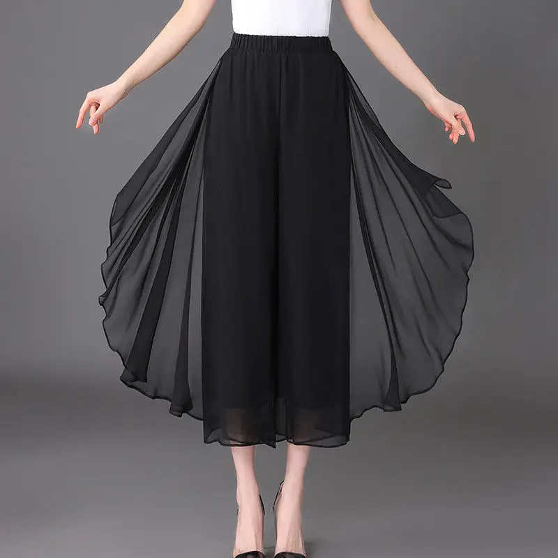 Pantalon Capri taille haute élastique pour femmes, vêtements d'été, ample, à la mode, couleur unie, épissé, en mousseline de soie, jambes larges, nouvelle collection 2025