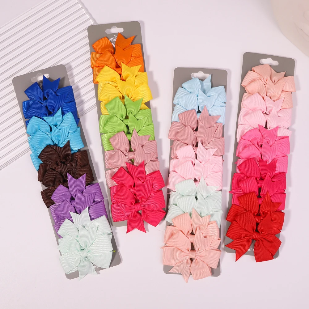 10 pz/lotto simpatici fiocchi per capelli in tinta unita con clip per bambini ragazze fermagli per capelli con nastro in Grosgrain mollette accessori per capelli copricapo