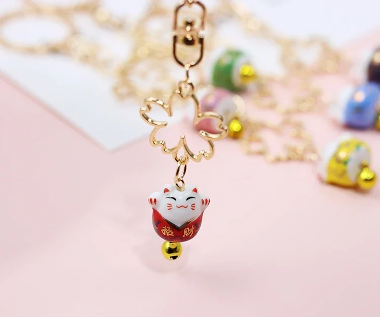 2025 Cute Ceramics Maneki Neko Lucky Cat Fortune Cat Sakura Keychain Key Chain Car Bag Pendent  Accessories Women D386