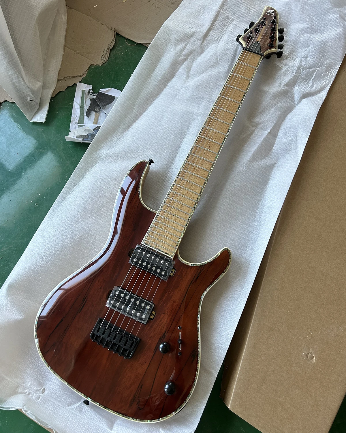 Factory Red Brown 7 Strings Electric Guitar Bird Eye Maple Fretboard HH Pickup Neck Through Body Wenge NeckCustomizable