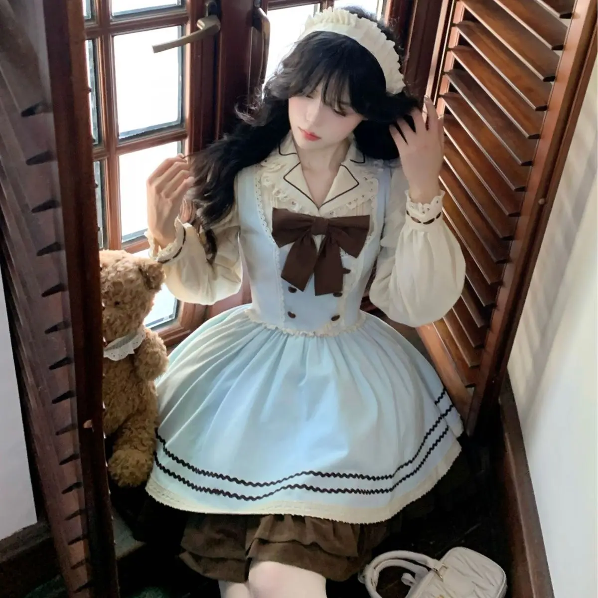 

Japan Sweet Bow Shirt + Cute Little Cake Waistline Puffy Suspender Skirt