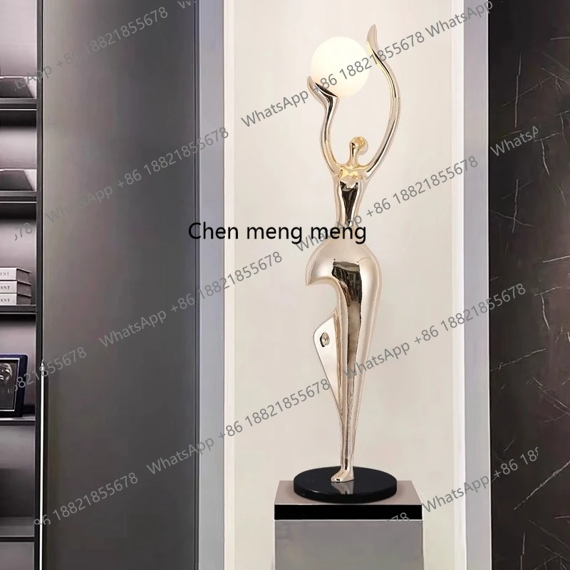 

Light luxury living room, floor-to-ceiling ornaments next to the sofa, humanoid art entrance