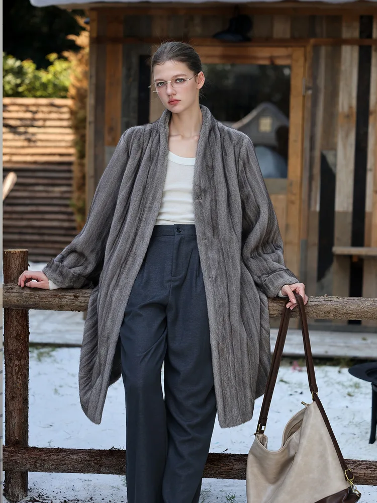 

A young velvet eco-friendly fur coat imitating mink, a mid-length, slimming and versatile all-in-one fur coat