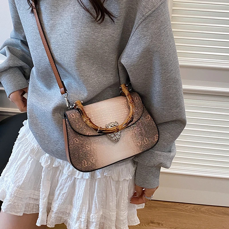 

Unique High-End Minimalist Vintage Leather Crossbody Bag for Women with Stylish Casual Letter Logo Design and Large Capacity