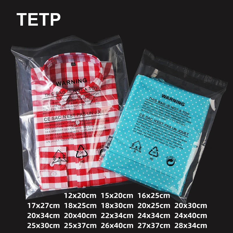 TETP 100Pcs Transparent Self Adhesive Bags With Warning Word For T-shirt Pants Bath Towel Packaging Display Home Storage Bag