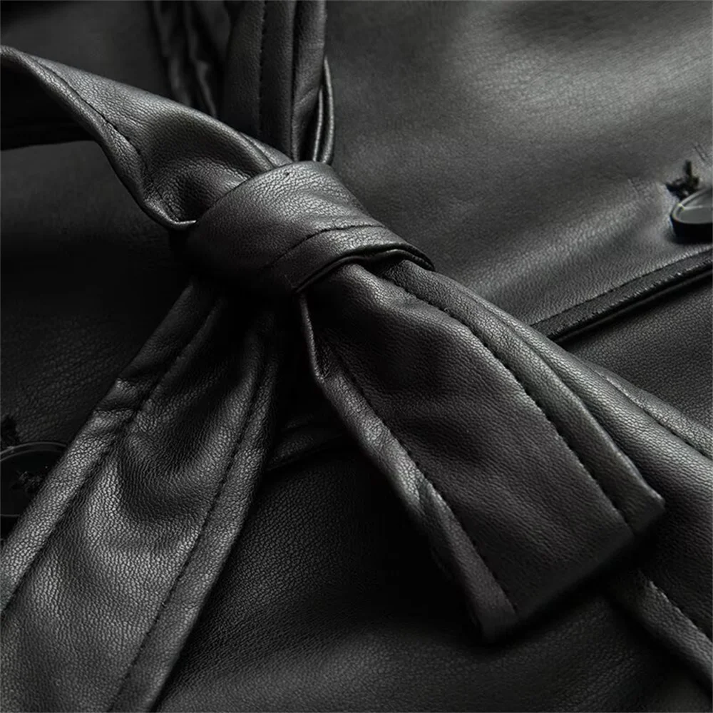 Nouveau automne et hiver femmes papillon arc ceinture épaulière PU imitation cuir revers à manches longues coupe-vent court