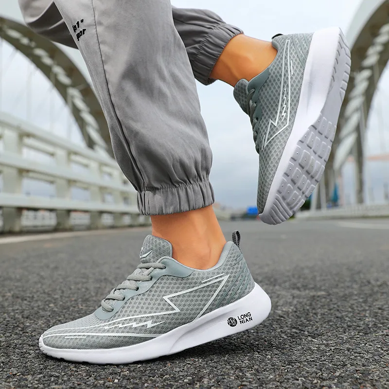 Hete Verkoop Mesh Hardloopschoenen Voor Heren Outdoor Lichtgewicht Ademende Damessneakers Mode Casual Witte Sportschoenen Heren Dames