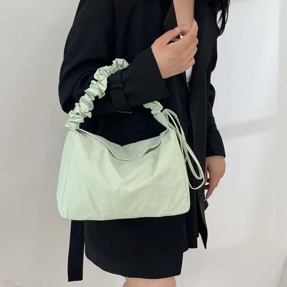 

Korean Style Solid Color Crossbody Bag Wrinkle Drawstring Strap Niche Design Light Soft Nylon Bag Zipper Tote Bag Shoulder Bag