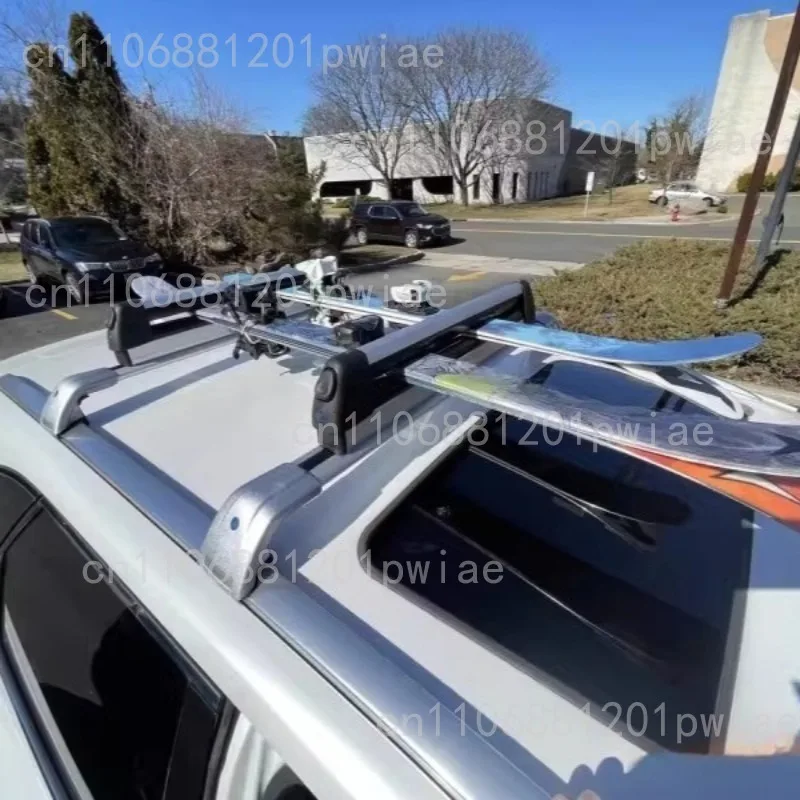 Roof-mounted ski rack for SUVs; rack for carrying single or double skis; ski and snowboard clamps; roof-mounted ski rack