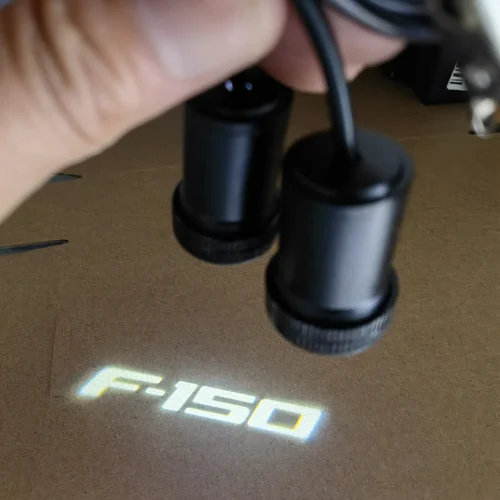 Imagen 2 del producto 2 uds puerta fantasma para Ford F-150 Logo luz Ford bienvenida luz F-150 puerta luz LED láser lámpara de cortesía para Ford F150 estilo de coche