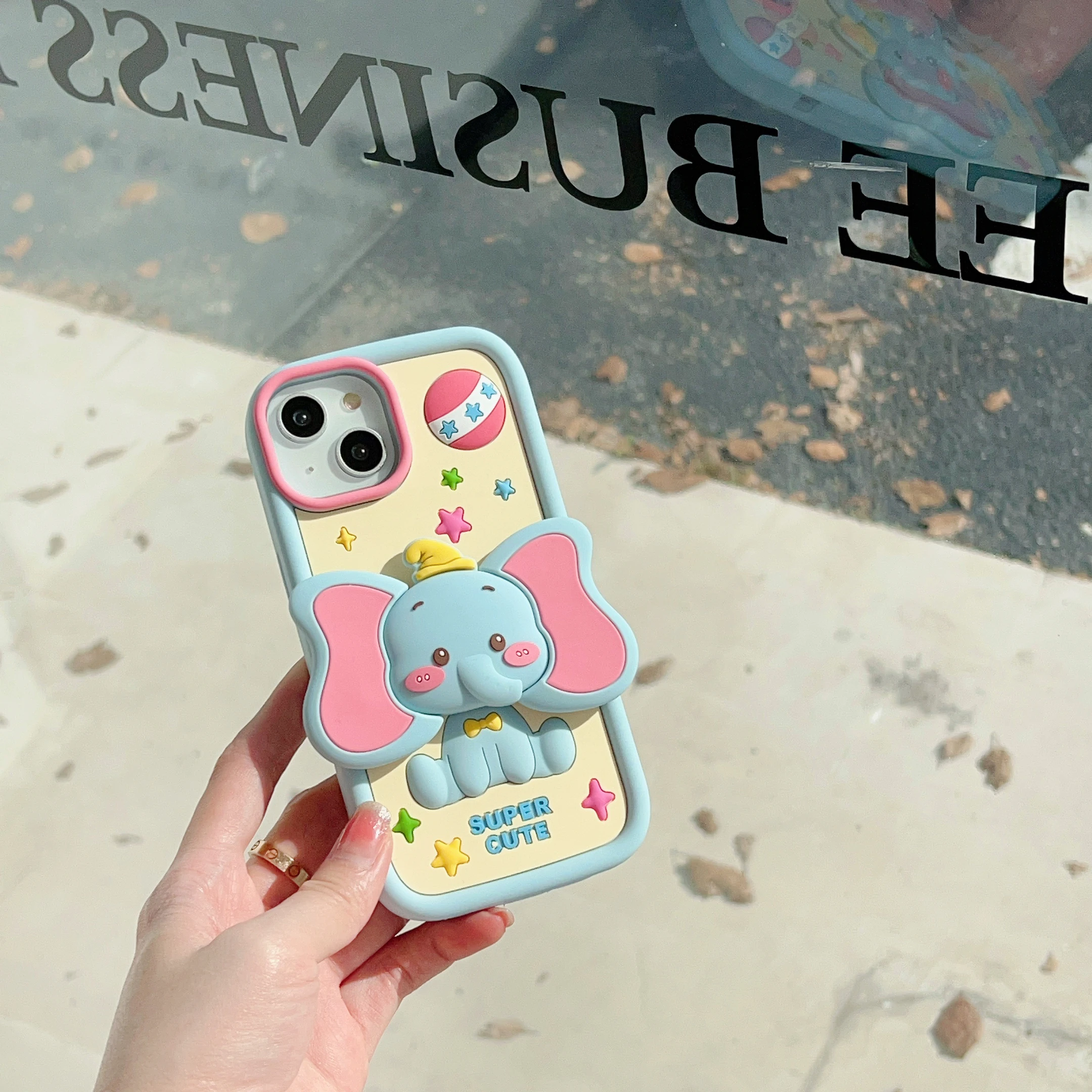 

Dreamy Cream Colored Dumbo Elephant Ears Bracket Silicone Phone Case For iPhone 17 12 13 14 15 16 11 Pro Max Anti Drop Case