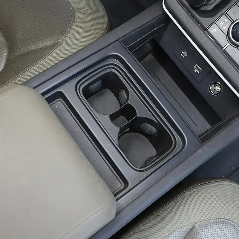 1PCs TPE Black For Land Rover Defender 90 110 130 2020-2025  Car Center Console Water Cup Holder Storage Box sticker Accessories