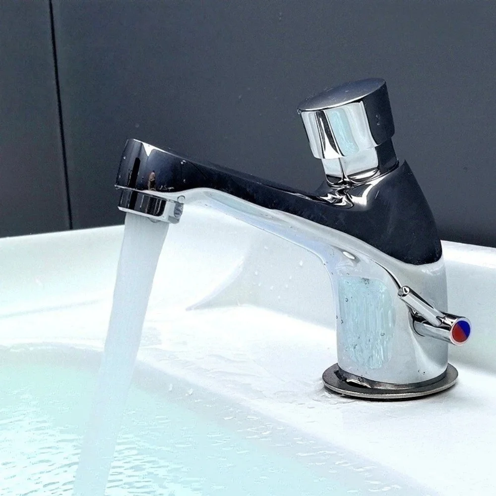 All-copper push-button delayed-flow faucet for hot and cold water