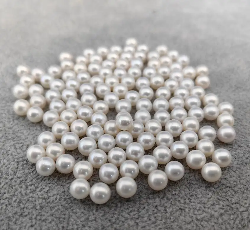 China manufacturer 6-6.5mm natural cultured white/purple round freshwater loose pearl for jewelry