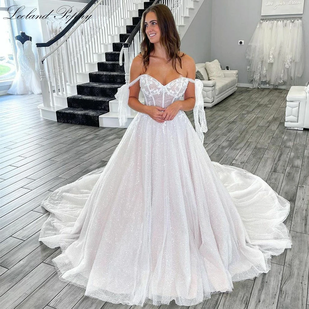 Lceland Poppy Customized A Line Boat Neck Beaded Lace Wedding Dresses Sleeveless Glitter Tulle Bridal Gowns with Chapel Train