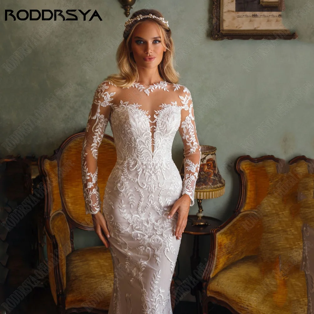 RODDRSYA Exquisite Zeemeermin Bruidsjurk Lange Mouwen O-hals Kant Applique BruidsjurRODDRSYA voortreffelijke zeemeermin trouwjurk lange mouwen met O-hals kant applique bruidsjurken illusie terug Tulle Vestidos De Novia