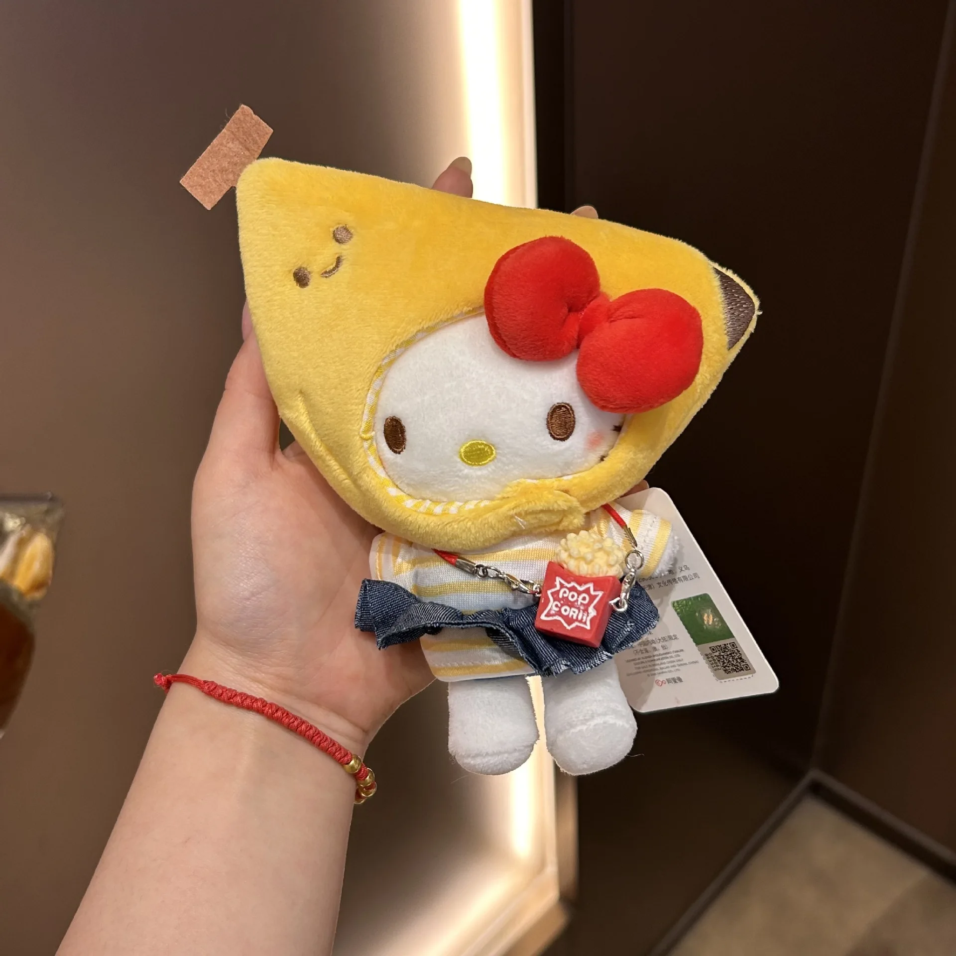 

Sanrio Hello Kitty Banana Head Cover Plush Keychain Cute Fruit Theme Doll Pendant
