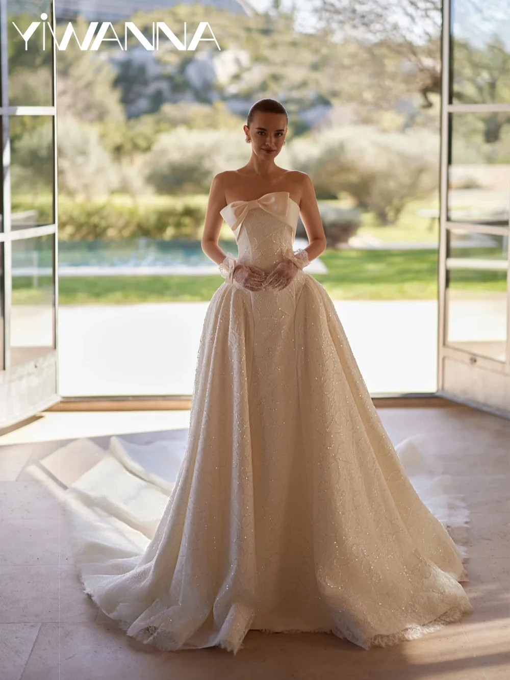 Robe de mariée captivante ornée de perles, luxueuse robe de mariée longue en dentelle coupe trapèze, robes classiques personnalisées sans bretelles avec nœud pour la mariée