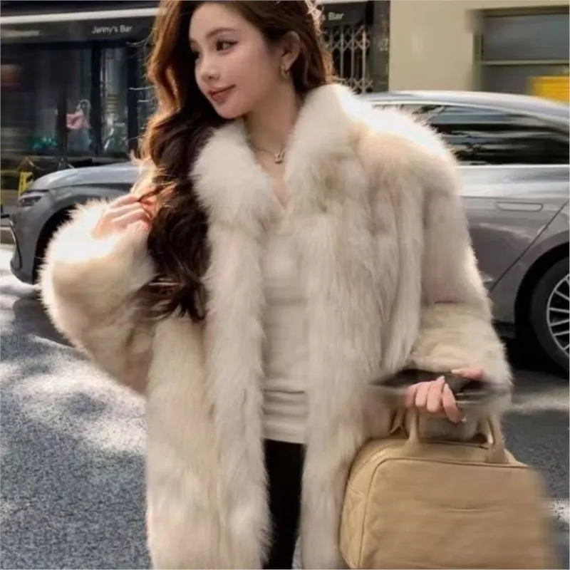 

The new fur and coat with a stand-up collar for women looks slimmer It features style