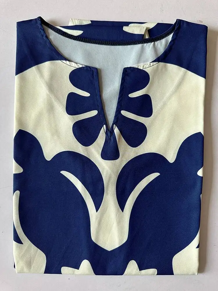 2025 Vêtements pour femmes transfrontaliers européens et américains Nouvelle robe col en V sans manches Sexy imprimé grand ourlet robe mi-longue RSY6