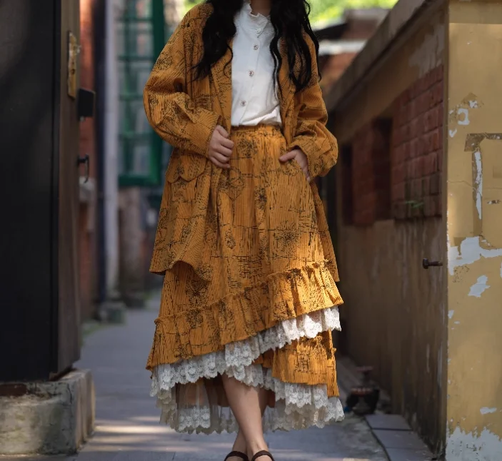 Autunno Inverno Moda Retro Velluto a coste Colore zucca Dolce pizzo Stampa Gonna Ragazza Versatile Riduzione dell'età Ruffles Gonne irregolari