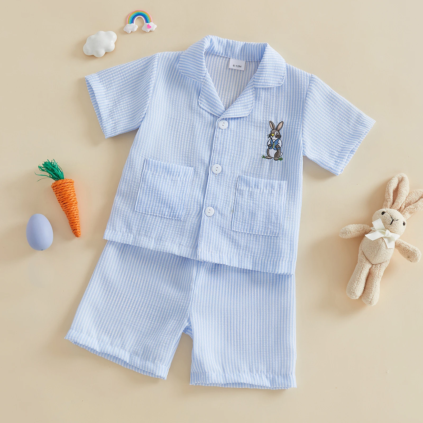 

Пижамы для малышей (девочек и мальчиков) на Пасху: комплект из рубашки с коротким рукавом на пуговицах и шорт с цветочным принтом, кроликами и яйцами. Детская шелковая пижама из сатина.