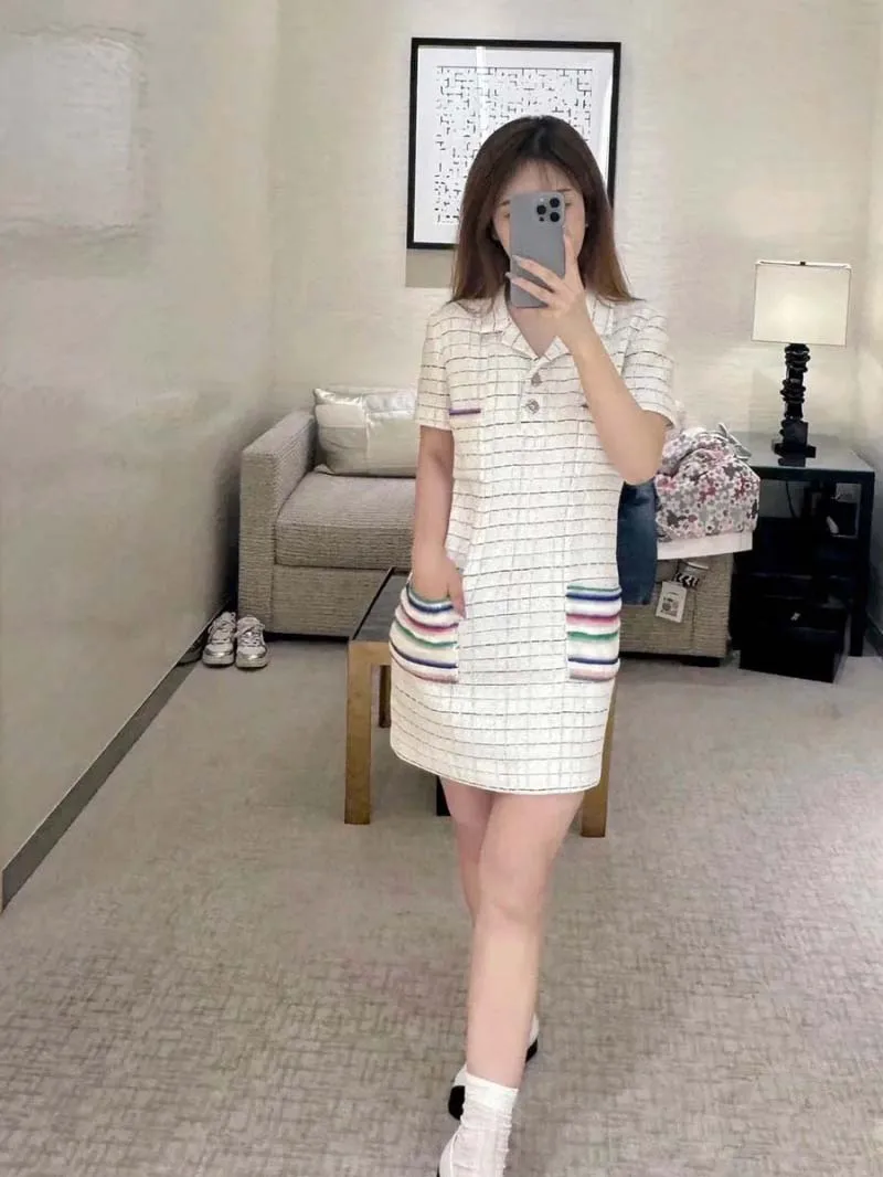 

Korean style women's dress with fashionable color plaid lapel and sequins embellishing short sleeved straight tube skirt