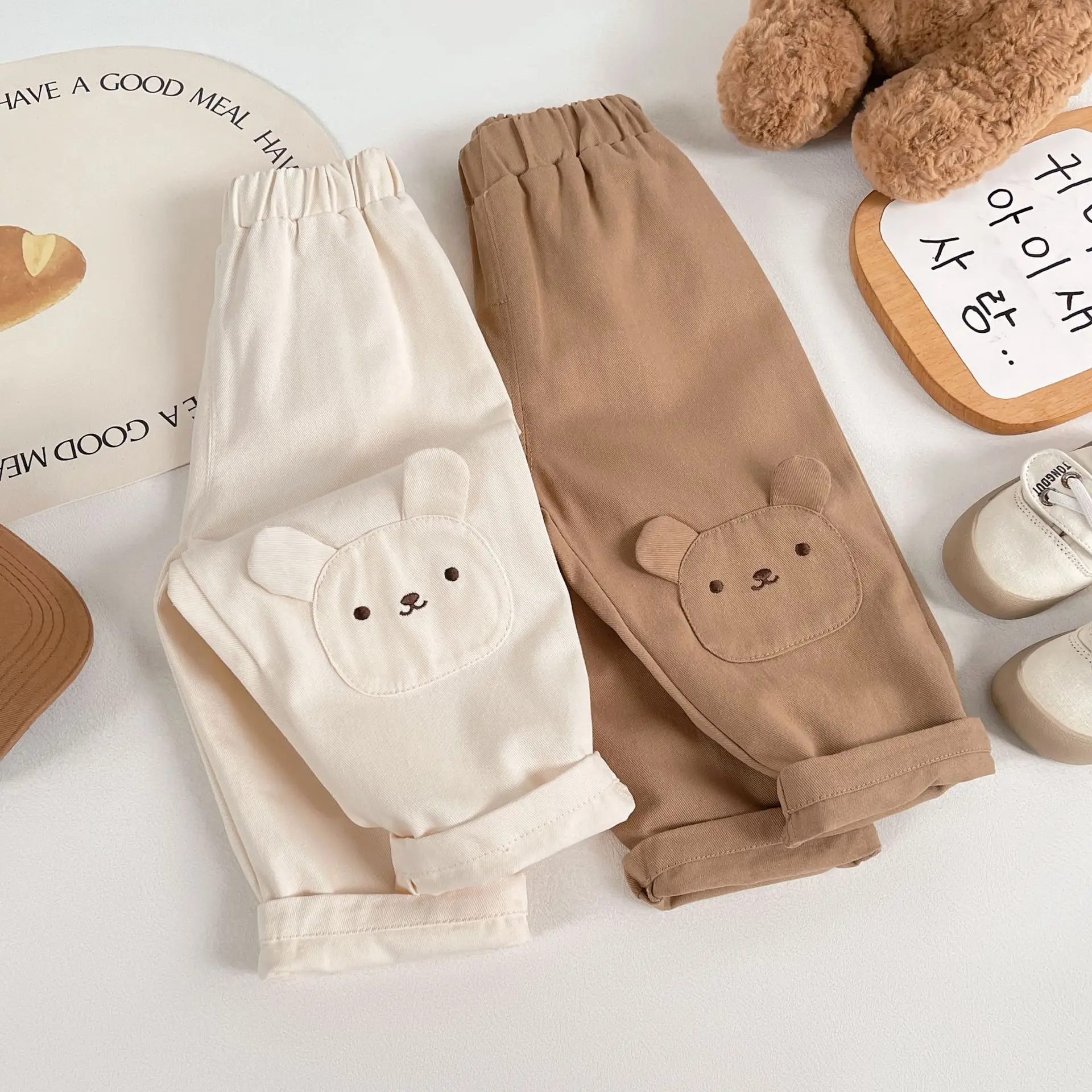 

2025 Autumn New Children s Slacks For Men And Women Featuring Cartoon Cute Designs Suitable For Outdoor Wear