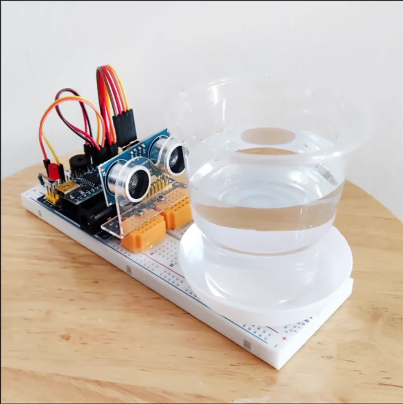 DIY kit for creative production of automatic sensing intelligent water drinking prompt device using microcontroller