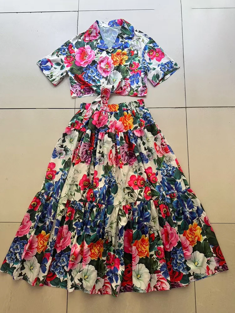 

A two-piece summer women's wear set featuring a designer's retro printed strappy waist-cinching short shirt and a loose skirt