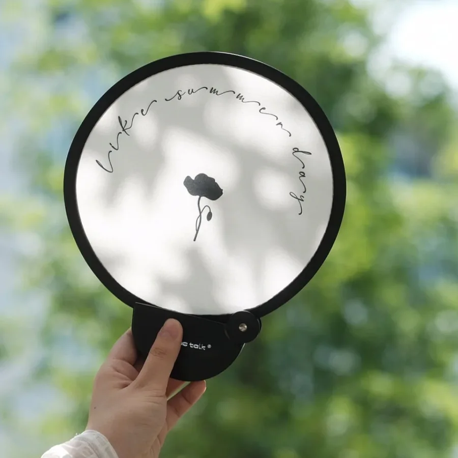 Portable handheld folding fan with storage bag, compact and portable, suitable for outdoor activities in summer