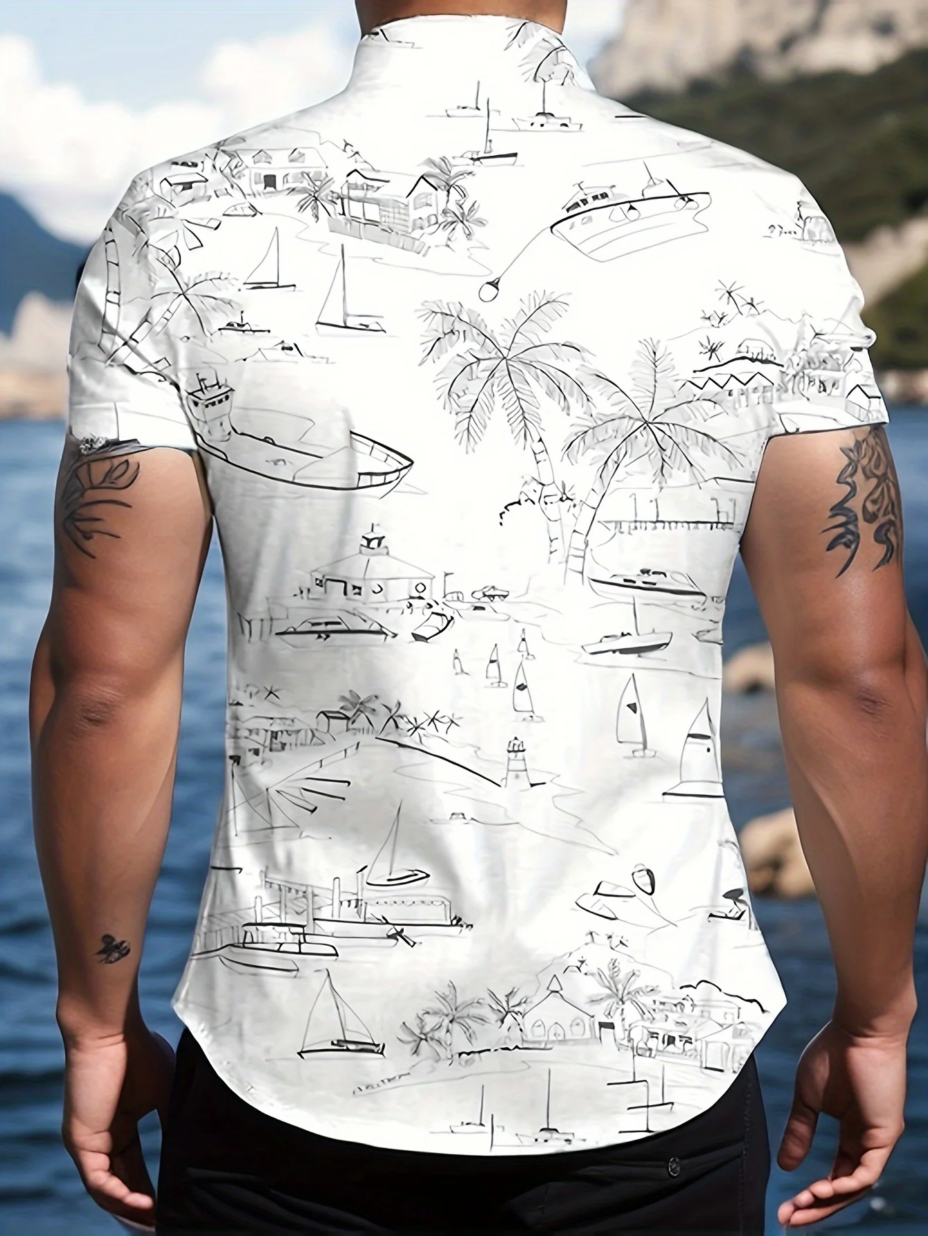 Men's shirt with unique design.Sketch-style men's shirt featuring coconut tree and sailboat patterns. Short-sleeved button-down