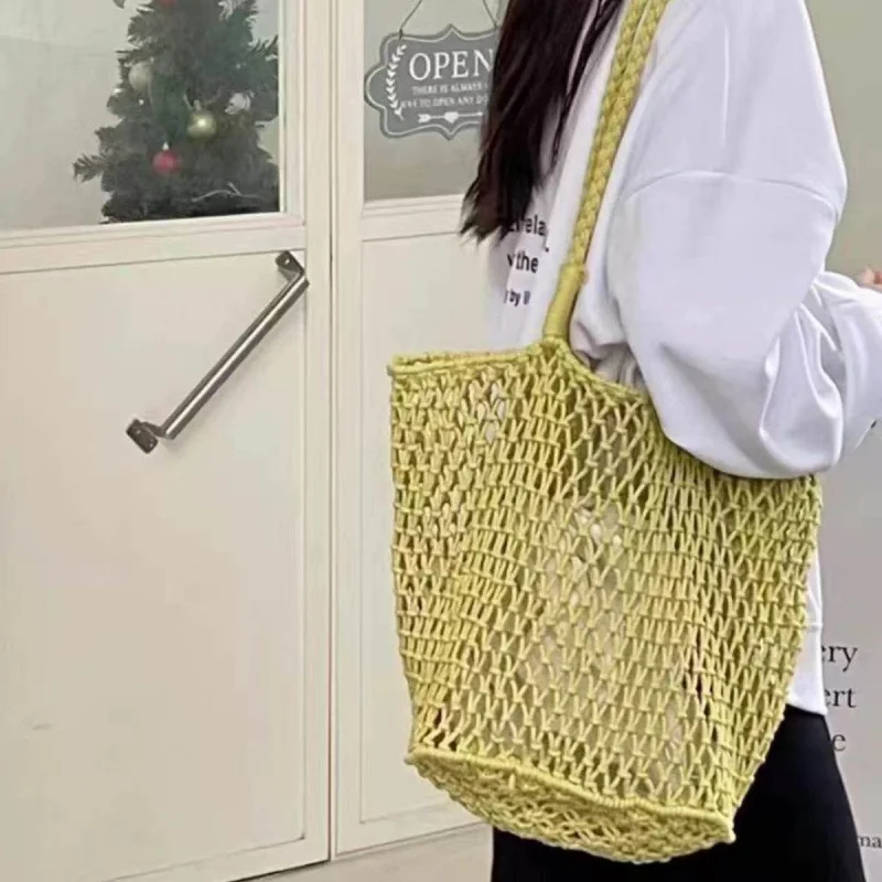 

2026Large-capacity French-style hollow-out hand-woven bag for women, casual handbag for female students, single-shoulder beach v