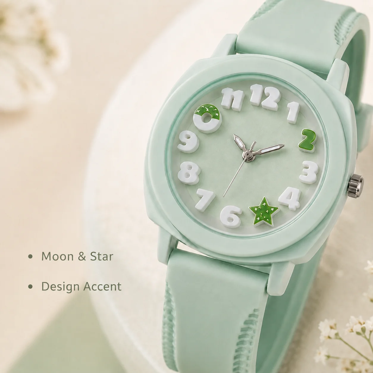 3D numeral dial analog watch with moon and star design, equipped with a soft silicone strap that is lightweight and comfortable.