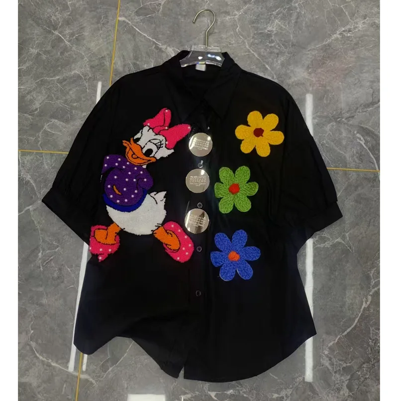 

Лето 2025 г., новая тяжелая лоскутная вязаная рубашка с цветочным принтом, модная свободная универсальная женская рубашка с мультяшным узором